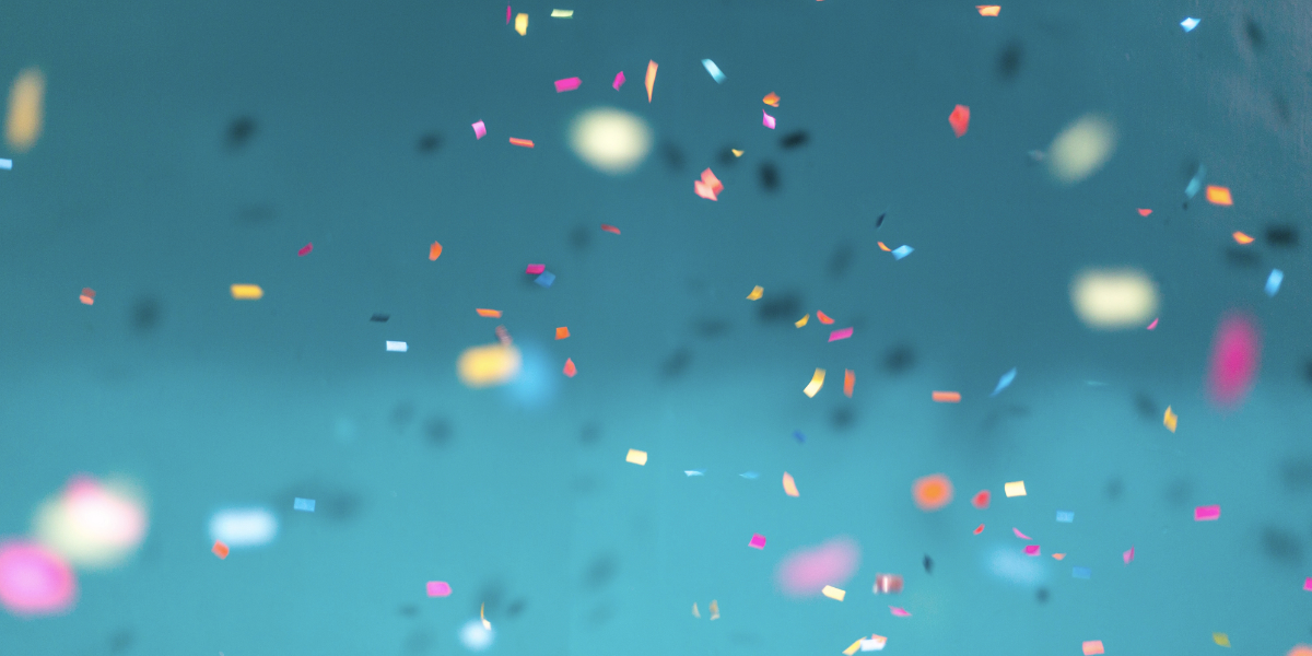 Confetti on teal blue background