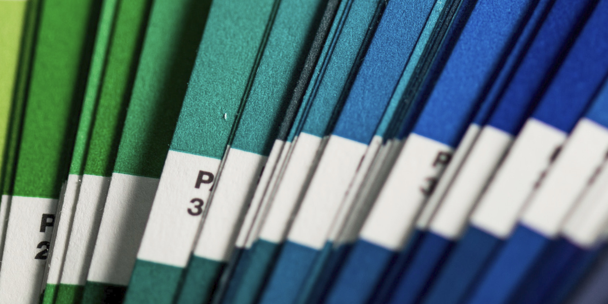 Closeup of green and blue manilla folders